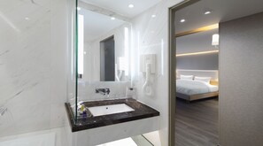 Junior Suite, City View | Bathroom | Shower, free toiletries, slippers, towels