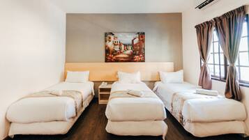 A hotel room with two single beds, a wooden nightstand, a painting on the wall, and a window with curtains.