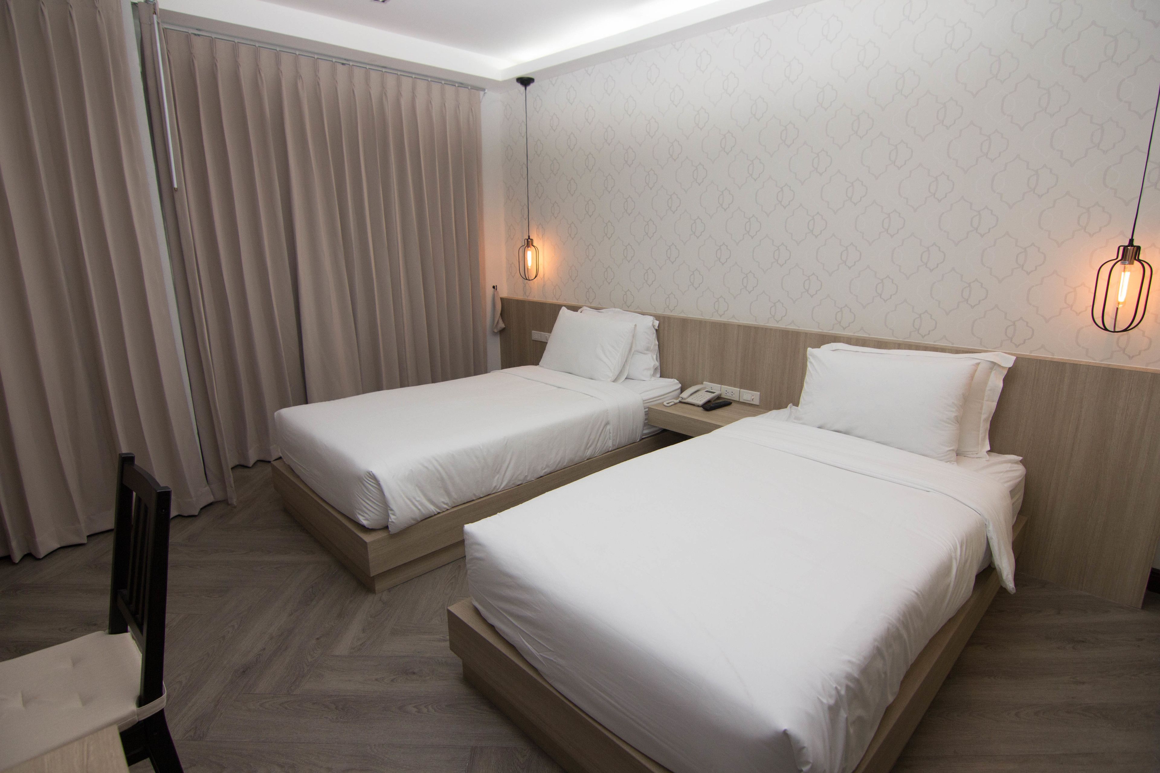 Standard Twin Room | Desk, blackout drapes, free WiFi