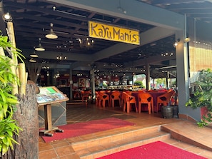 Breakfast, lunch served; local and international cuisine, pool views