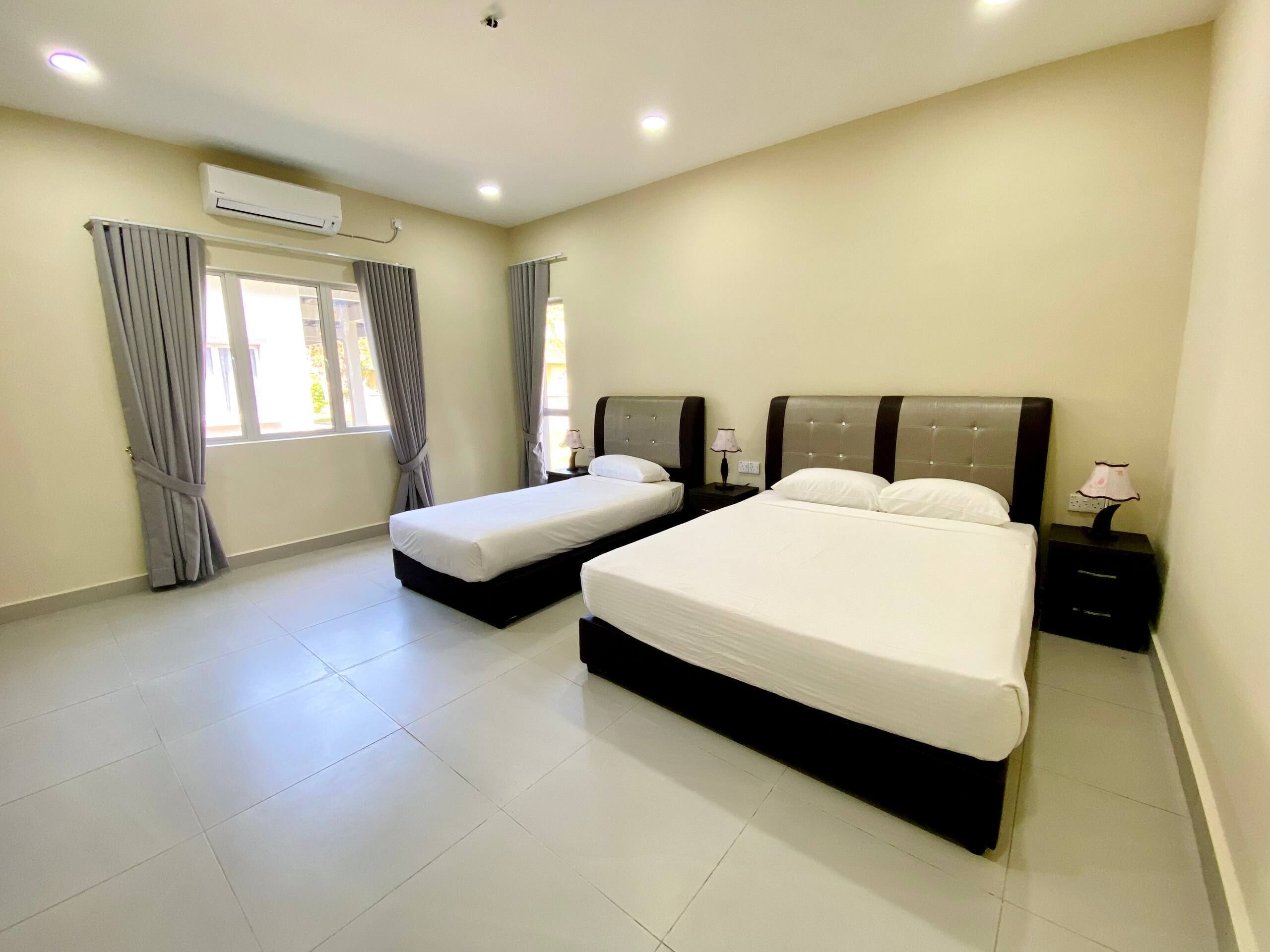 Deluxe-Dreibettzimmer | 3 Schlafzimmer, Schreibtisch, laptopgeeigneter Arbeitsplatz