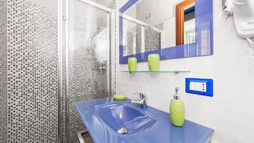 Shower, free toiletries, hair dryer