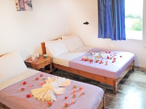 Kamar Quadruple, 1 kamar tidur | Setrika/meja setrika, tempat tidur bayi gratis, dan Wi-Fi gratis