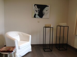 Quarto casal | Sala de estar | TV de tela plana