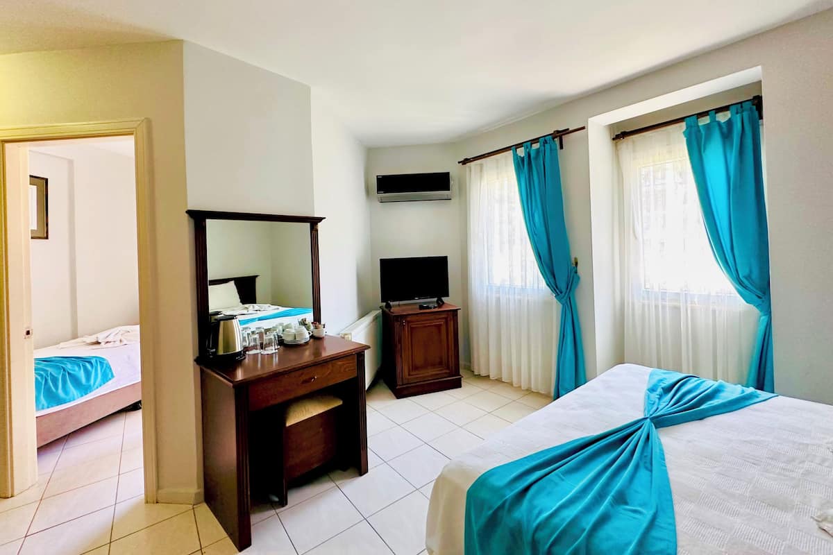 Junior Suite, 2 Bedrooms | Minibar, in-room safe, desk, iron/ironing board