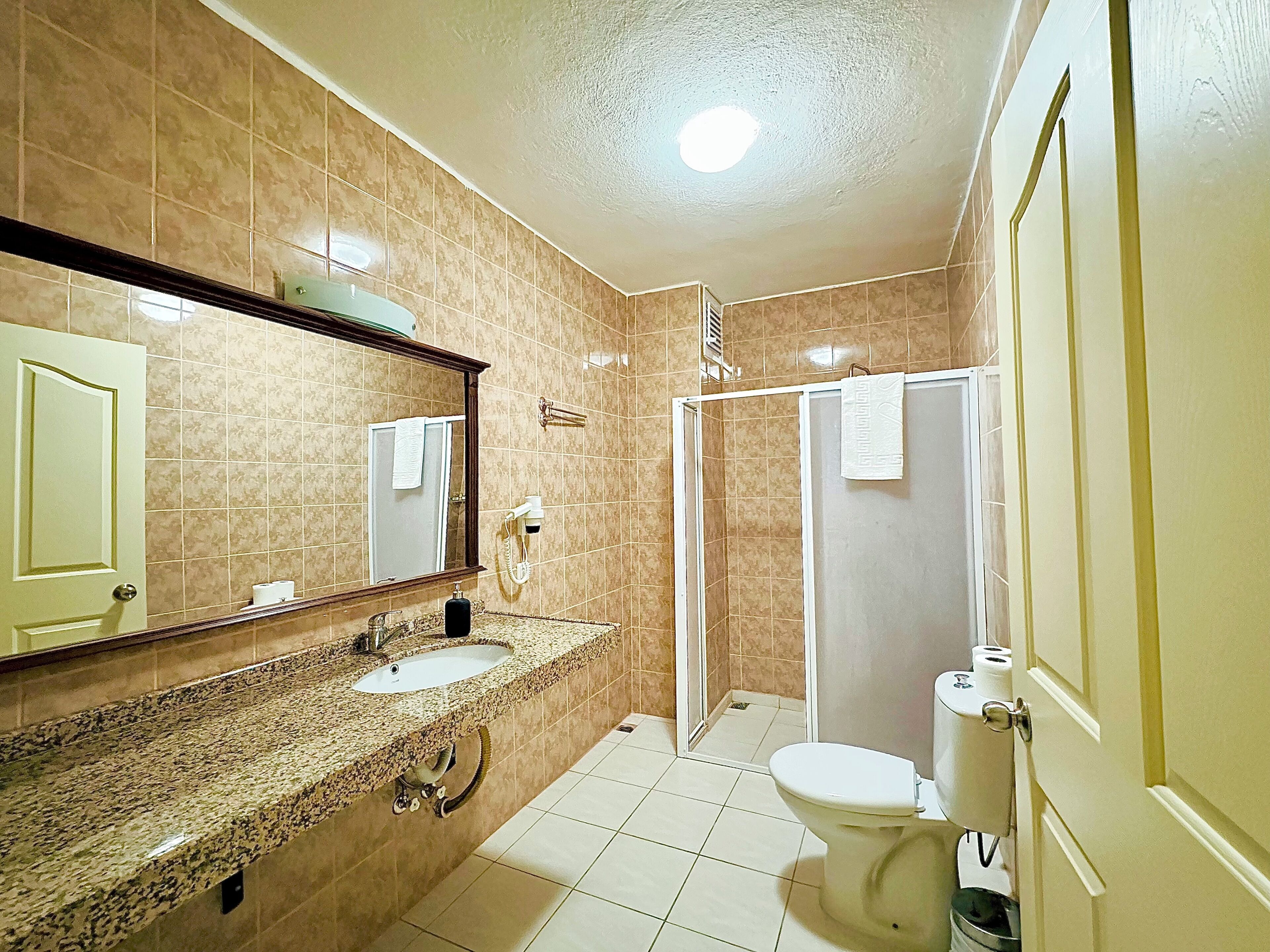 family suite, 2 bedrooms | bathroom | shower, free toiletries, hair dryer, slippers