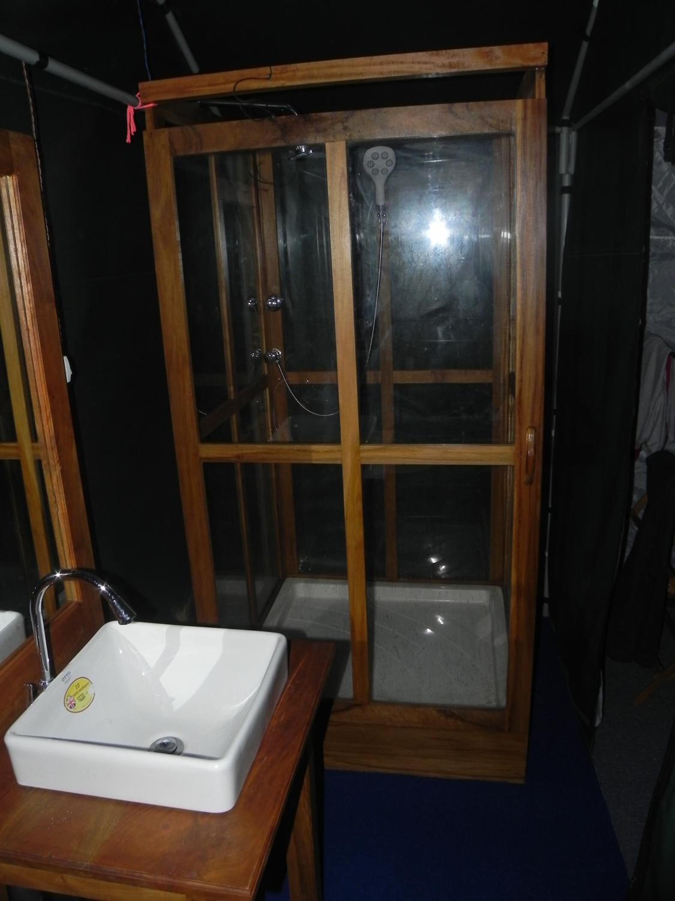 Shower, free toiletries, slippers, towels