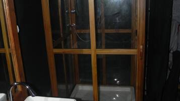Shower, free toiletries, slippers, towels