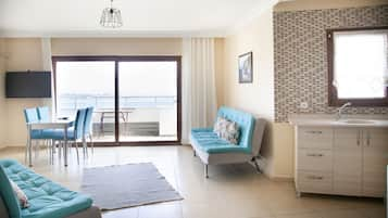 Apartment, Sea View (for 3 or 4) | Living room | LCD TV