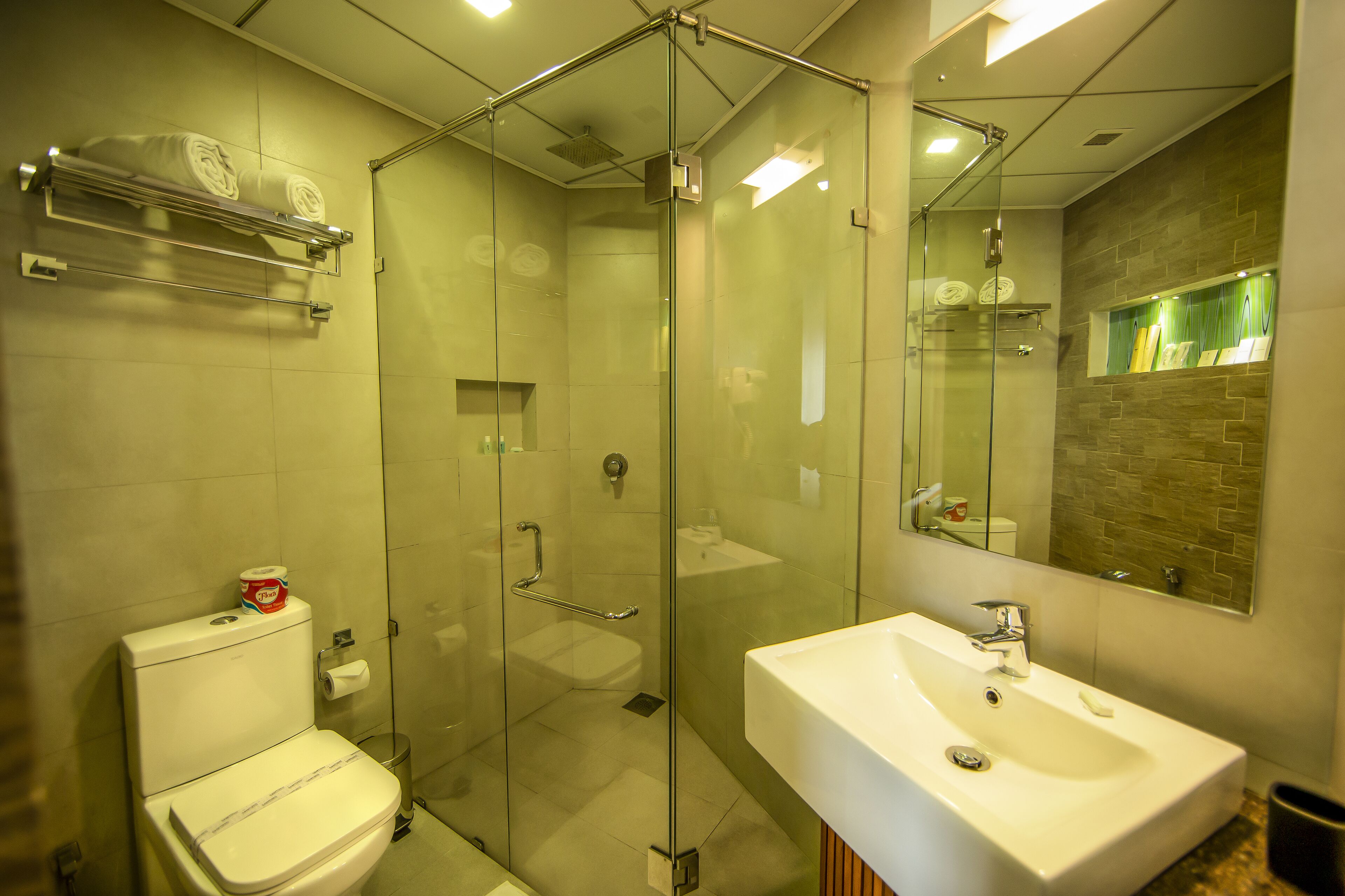 shower, free toiletries, bathrobes, slippers