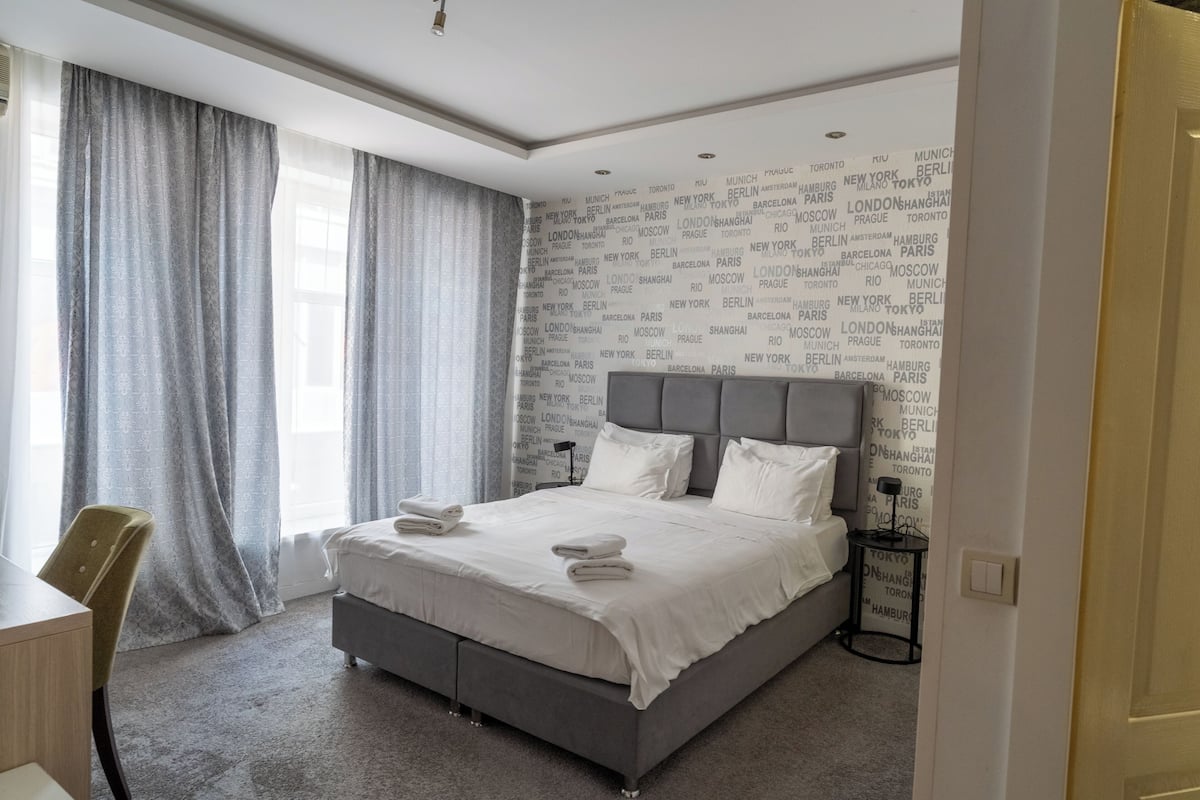 Economy Double Room, City View | Premium bedding, blackout drapes, soundproofing
