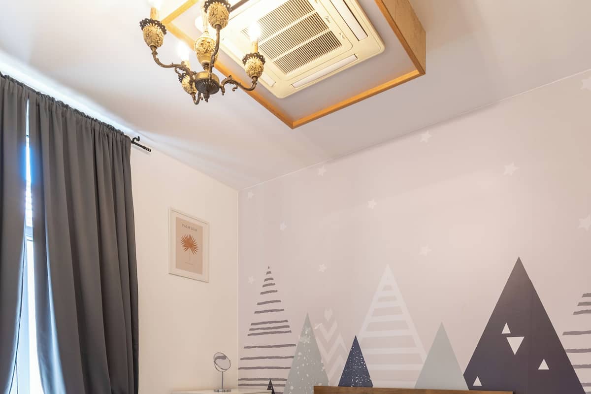 Comfort Apartment, Jetted Tub, City View | Premium bedding, blackout drapes, soundproofing