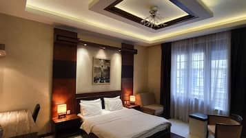 Premium bedding, minibar, desk, laptop workspace