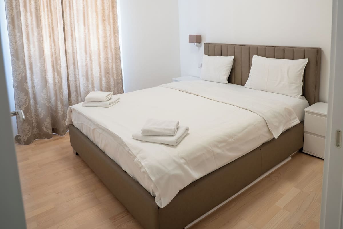 Deluxe Apartment, City View | Premium bedding, blackout drapes, soundproofing