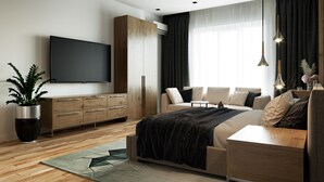 A modern bedroom with a large bed, a TV, a wardrobe, and a sofa.
