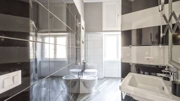 Superior Suite, City View | Bathroom | Shower, free toiletries, hair dryer, bathrobes