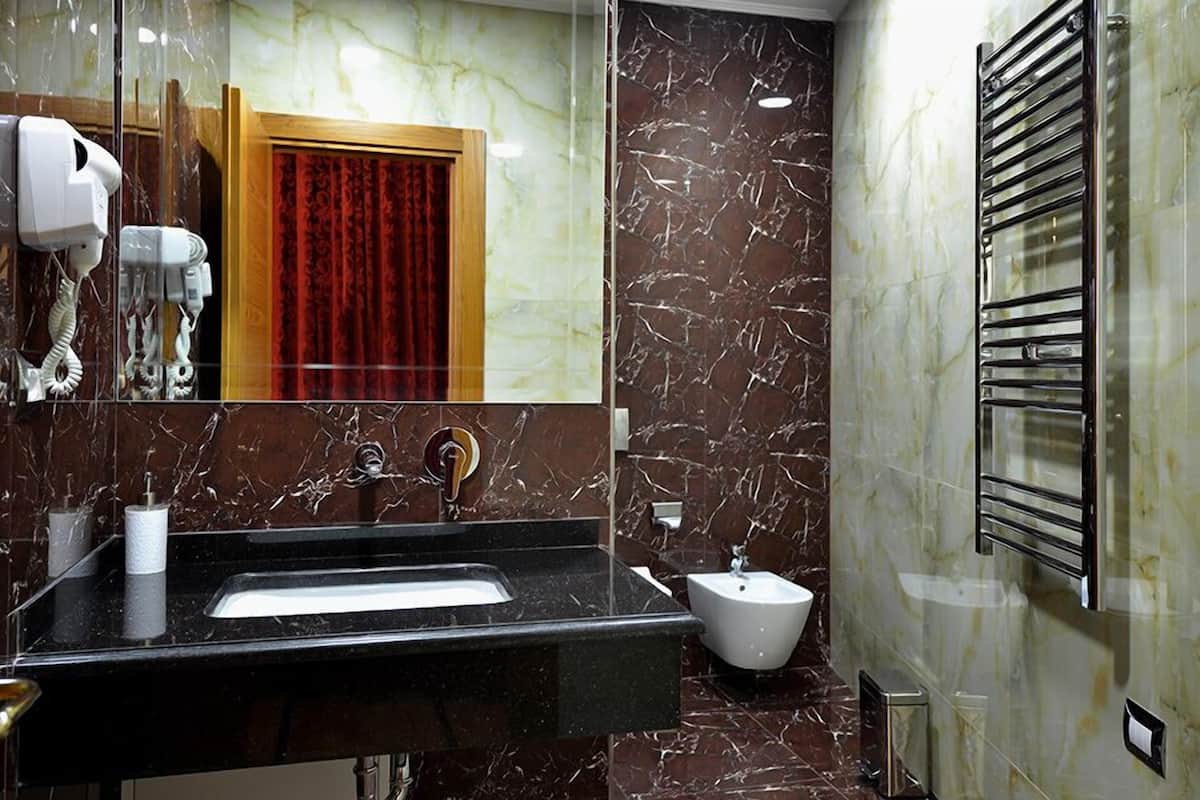 shower, free toiletries, hair dryer, bathrobes