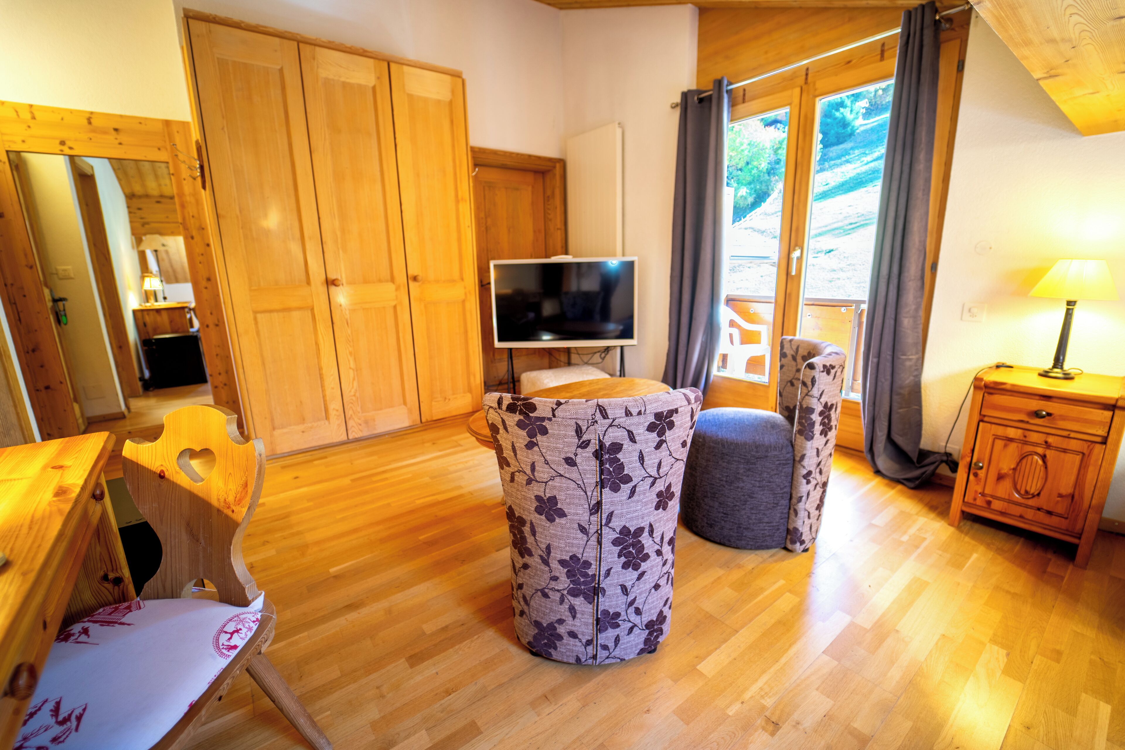 Habitación familiar | Minibar, caja fuerte, cortinas opacas y wifi gratis