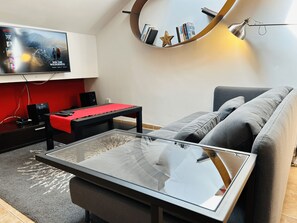 Appartement Deluxe, 1 chambre, patio | Coin séjour