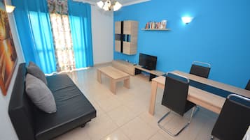 Appartement, 1 chambre (H Junior) | Salle de séjour | Télévision LCD de 32 pouces avec chaßnes par cùble, télévision