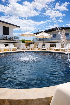 Outdoor pool, pool loungers - Luichy's Seaside Hotel (Cabo Rojo)