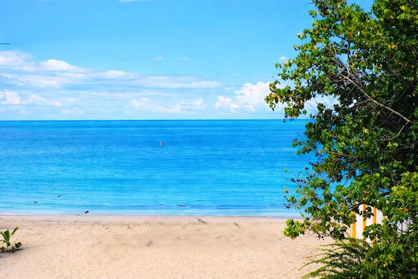 Deluxe Room, Partial Ocean View | Free WiFi, bed sheets