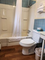 Combined shower/tub, hair dryer, bathrobes, towels