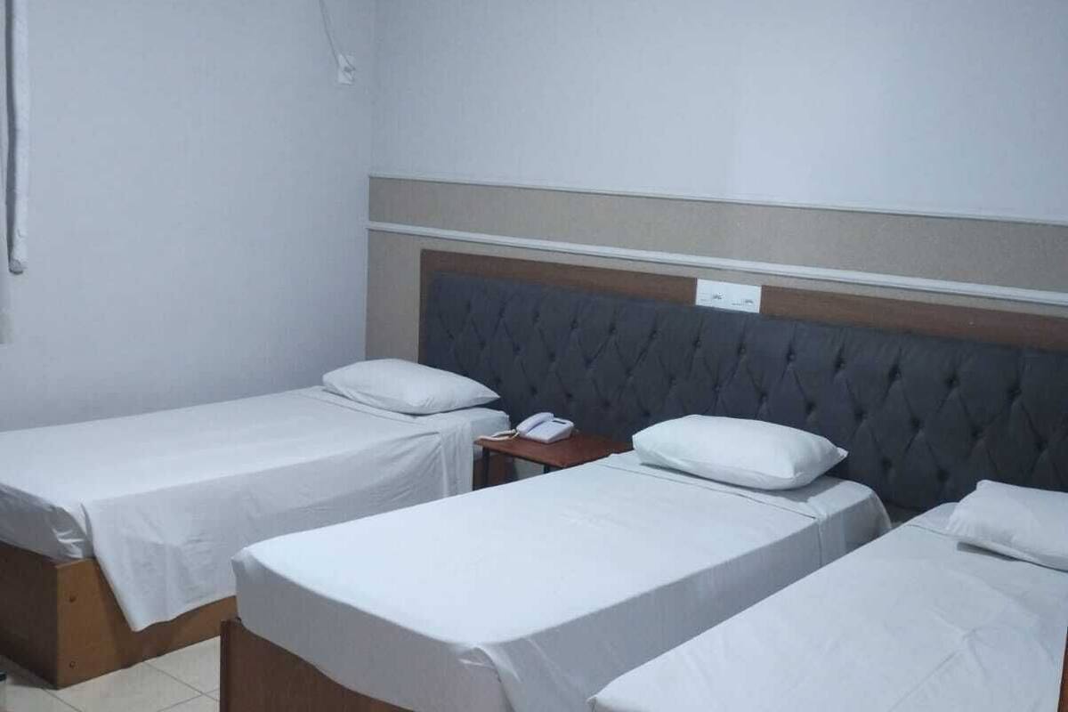 luxury triple room | minibar, desk, blackout curtains, free cots/infant beds