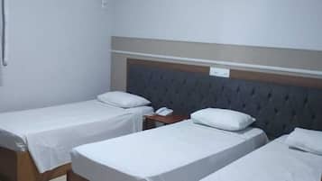 Luxury Triple Room | Minibar, desk, blackout drapes, free cribs/infant beds