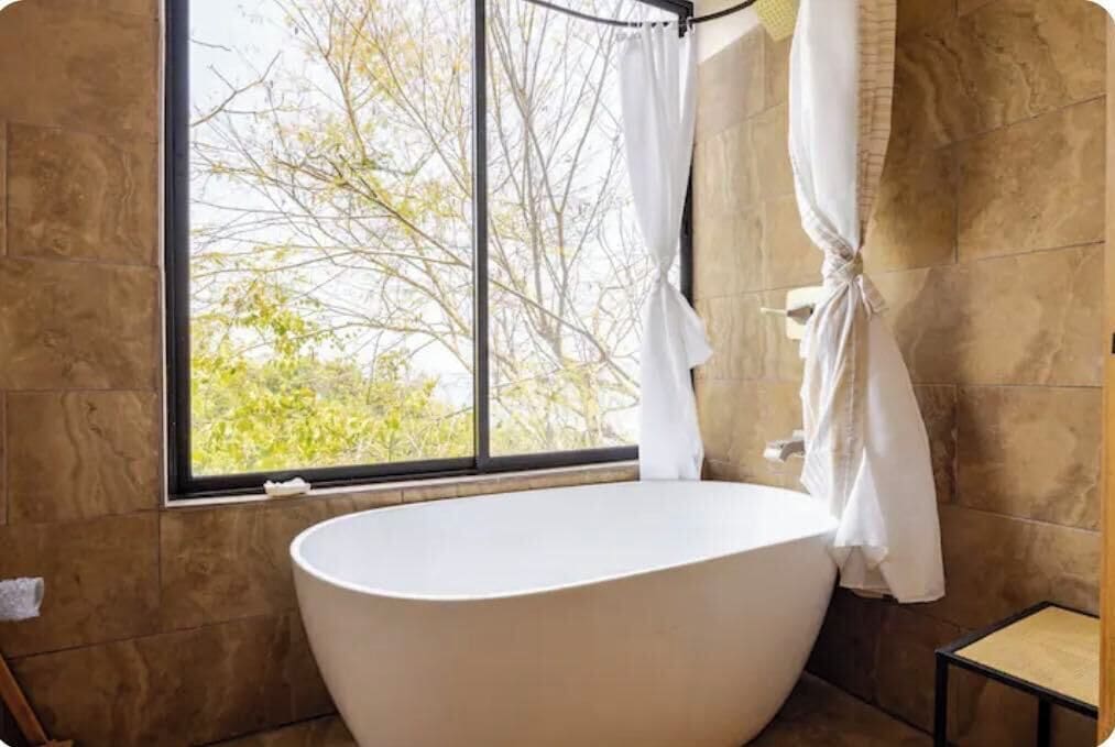 Departamento familiar | Baño | Regadera, amenidades de baño ecológicas, secadora de cabello, toallas 