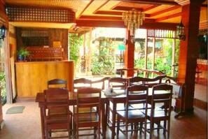 Breakfast, lunch, dinner served; local cuisine 