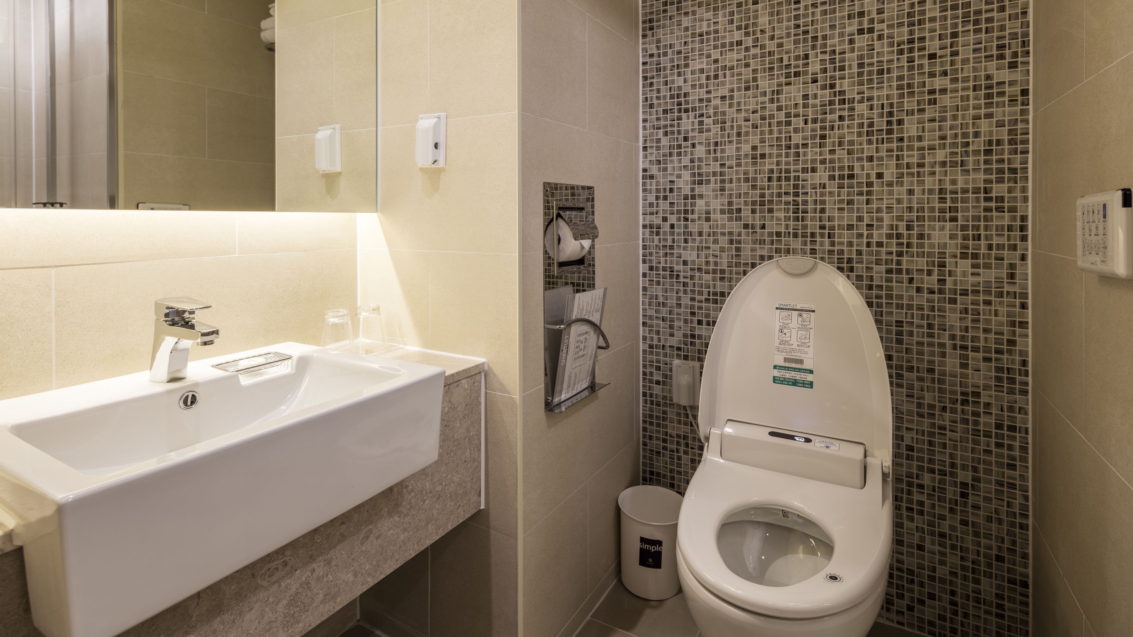 shower, hair dryer, slippers, bidet