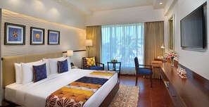 Premium bedding, memory foam beds, minibar, in-room safe