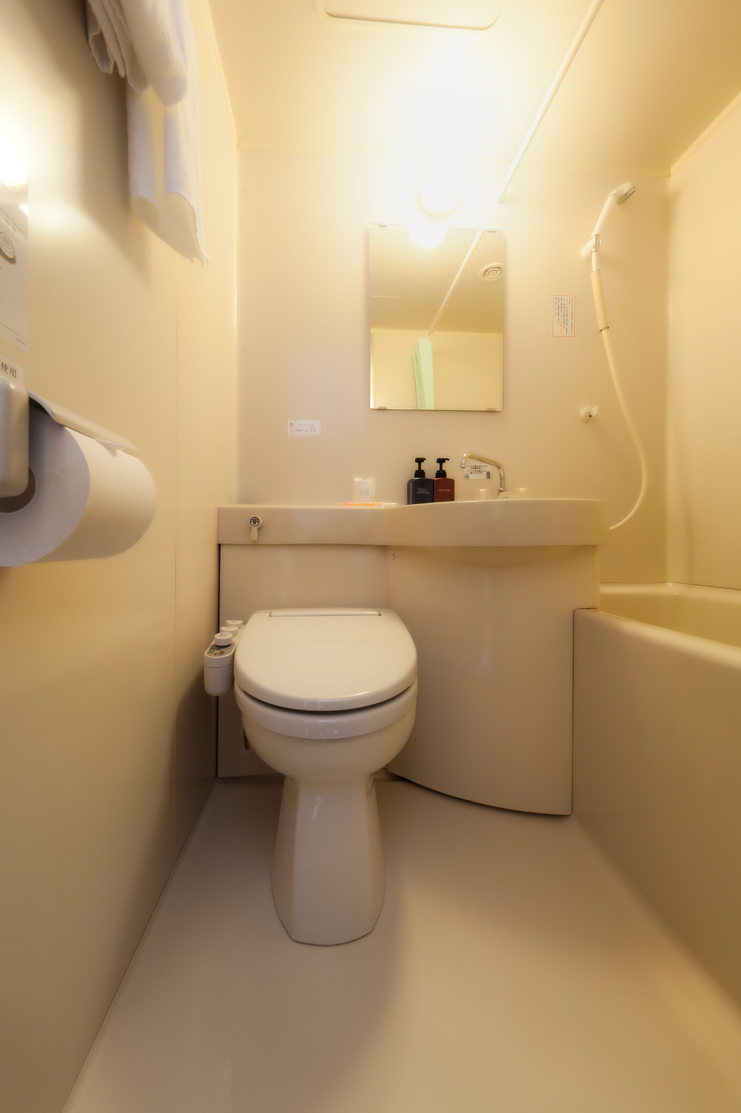 free toiletries, slippers, bidet, towels