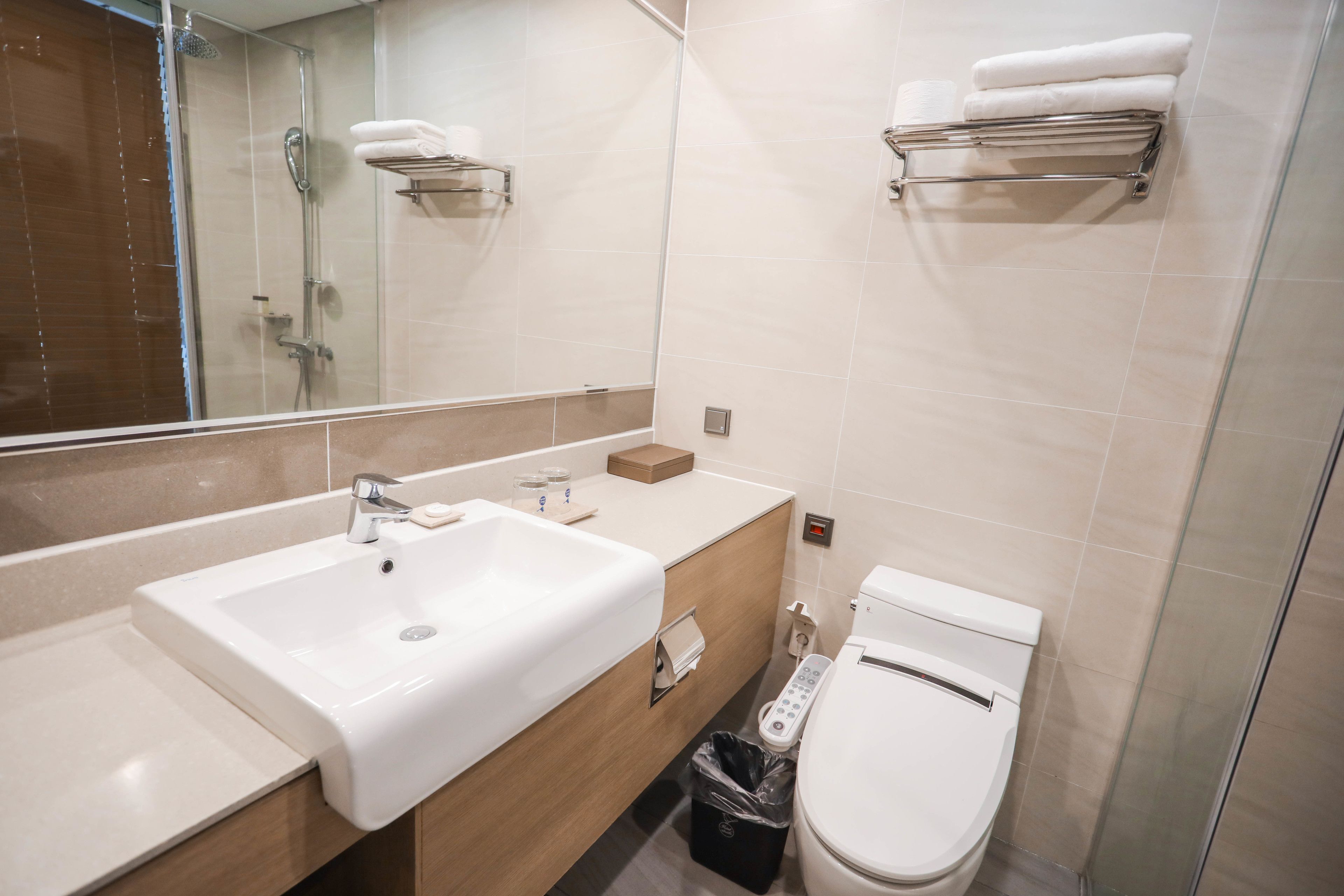 shower, hair dryer, slippers, bidet