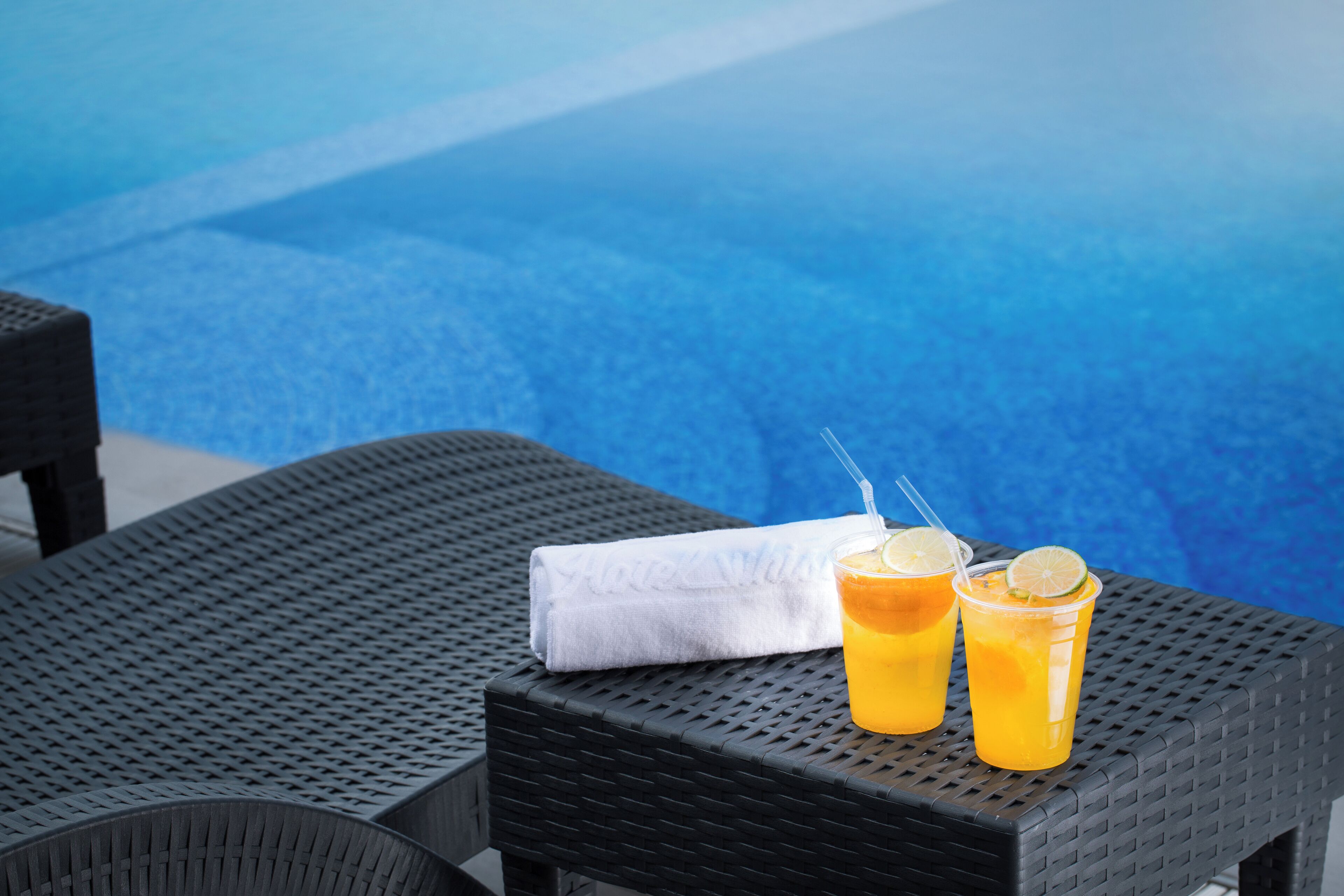 seasonal outdoor pool, open 2:00 pm to 9:00 pm, pool loungers