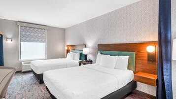 Hypo-allergenic bedding, down duvets, in-room safe, desk