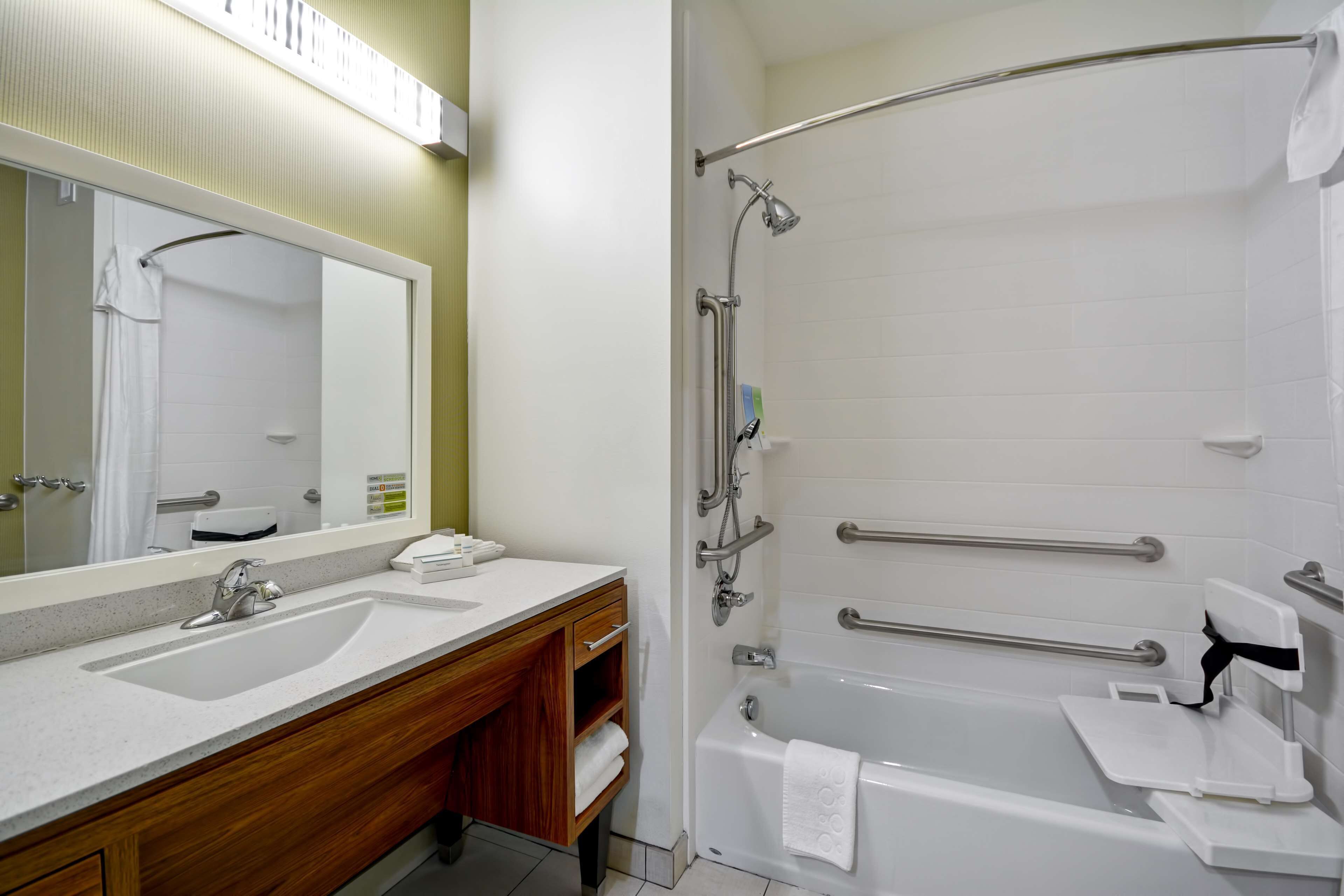 studio, 1 king bed, accessible, bathtub (mobility & hearing) | bathroom | combined shower/bathtub, free toiletries, hair dryer, towels