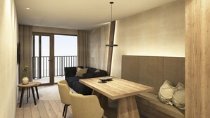 A modern living space with a wooden dining table, a sofa, and a balcony with a view. - Aparthotel Kronplatz Luxury House (Valdaora)