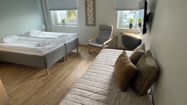 Desk, blackout curtains, soundproofing, free WiFi