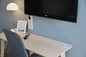 Desk, blackout curtains, soundproofing, free WiFi