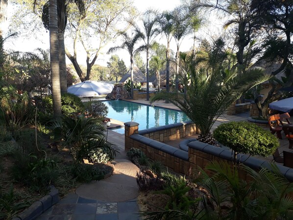 Outdoor pool, pool umbrellas, pool loungers
