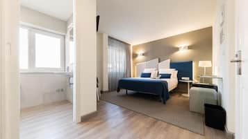 Roba de llit d'alta qualitat, minibar i caixa forta a l'habitació