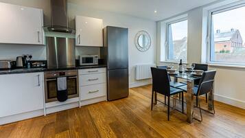 Executive Apartment, 2 Bedrooms | Private kitchen | Fridge, microwave, oven, dishwasher