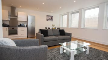 Executive Apartment, 2 Bedrooms | Living area | Flat-screen TV