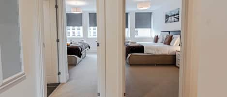Departamento ejecutivo, 2 habitaciones | Área de sala de estar | Televisión de pantalla plana