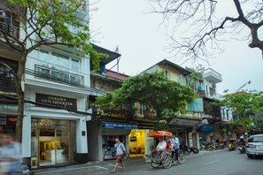 A street view with a building labeled "Luxury Old Quarter". - Luxury Old Quarter Hotel & Gym (Hanoi)