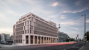 A modern hotel with a grid-like facade, multiple floors, and a prominent 'Capri' sign. - Capri by Fraser Berlin (Berlin)
