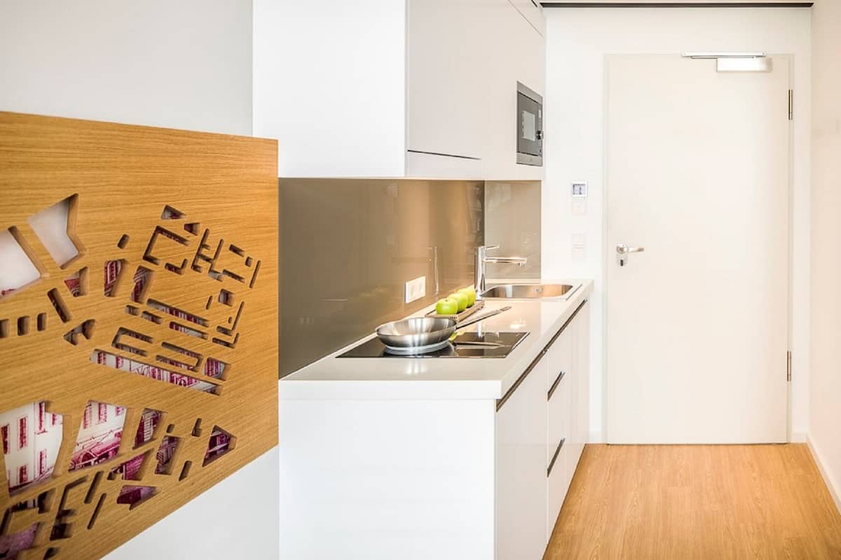 full-sized fridge, microwave, stovetop, coffee/tea maker