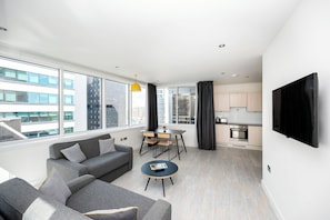 A modern apartment with a living area, dining space, and kitchen. - Staycity Aparthotels, Manchester, Piccadilly (Manchester)